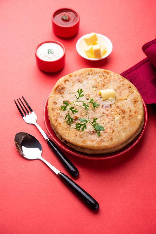 Aloo paratha with curd